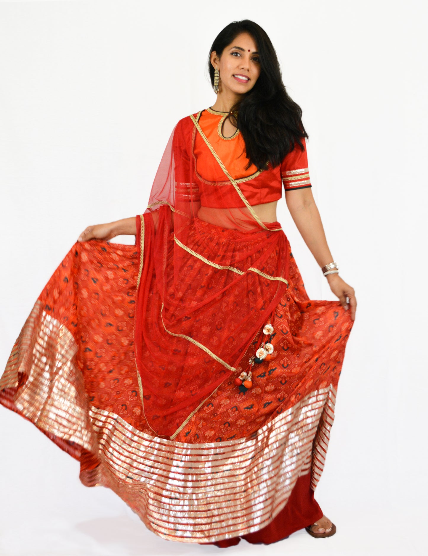 Rent Red Printed Lehenga Skirt with Matching Blouse & Dupatta