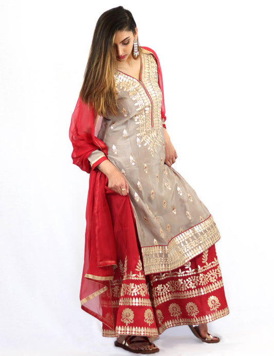 Rent gray embroidered kurta with red sharara and dupatta