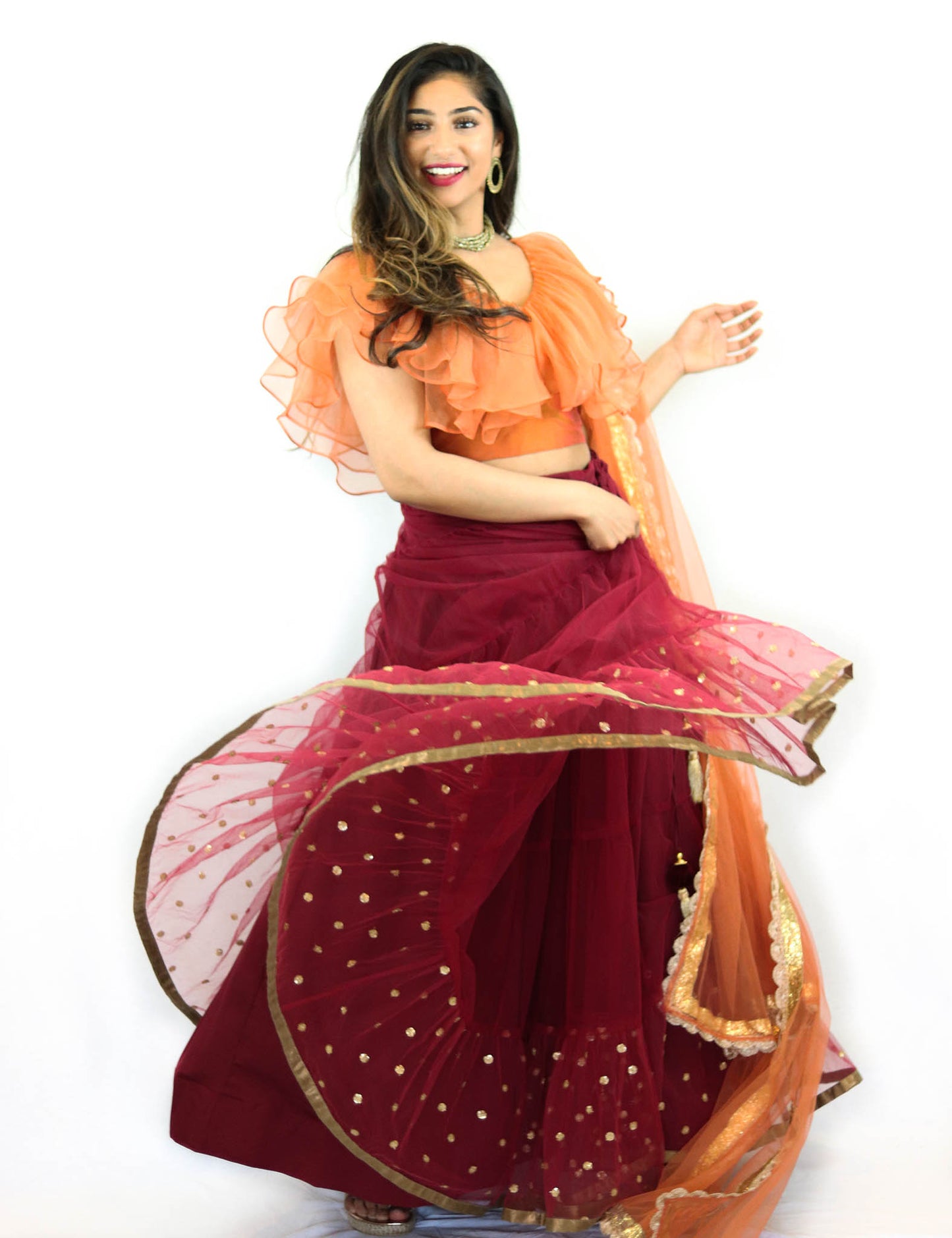 Rent Burgundy Lehenga With Orange Ruffled Blouse & Dupatta