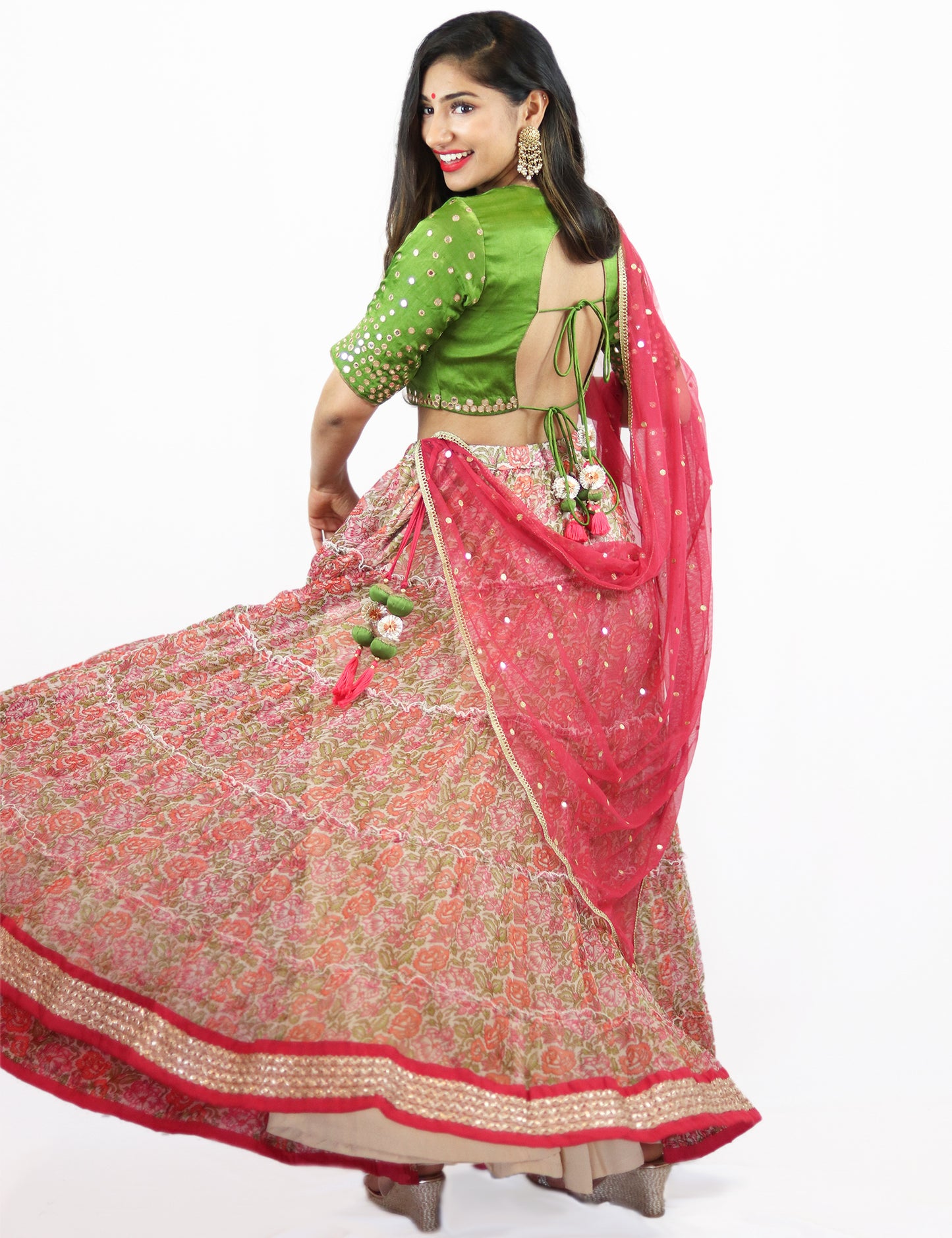 Rent Floral Lehenga with Green Blouse & Punch Pink Dupatta