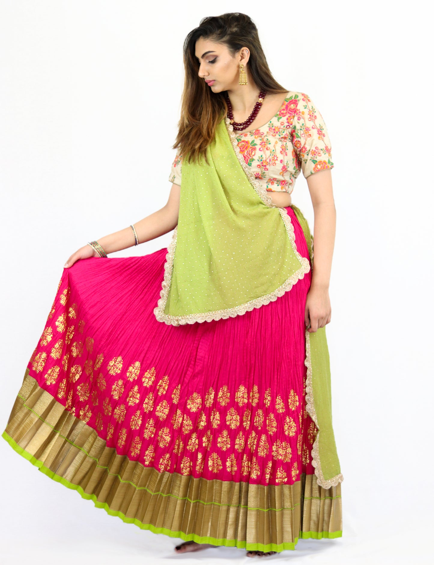 Rent Pink Pleated Lehenga with Embroidered blouse and Lime Green Dupatta