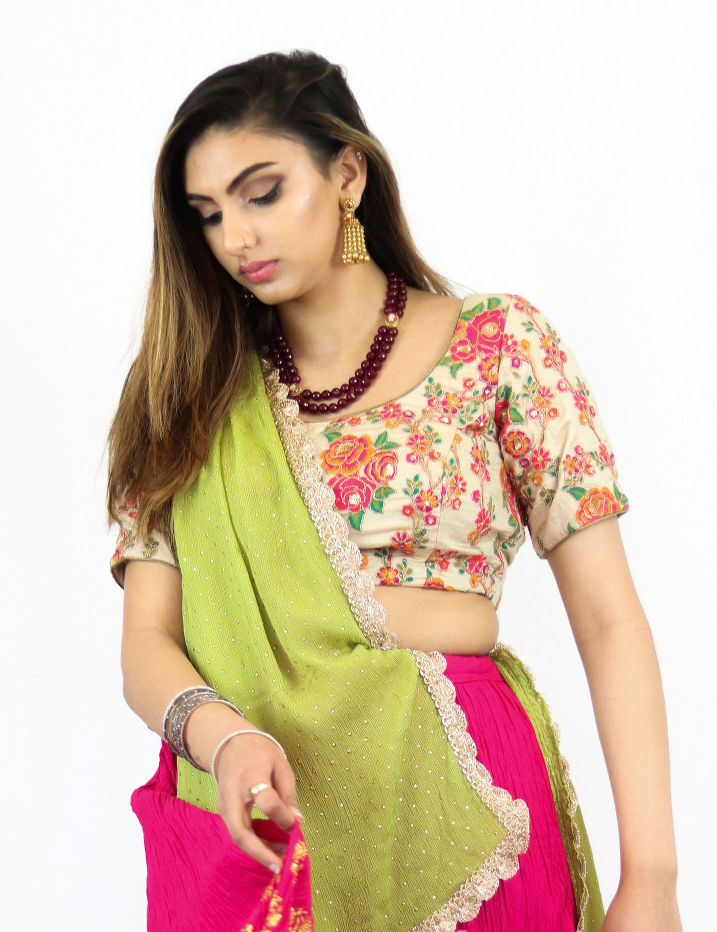 Rent Pink Pleated Lehenga with Embroidered blouse and Lime Green Dupatta