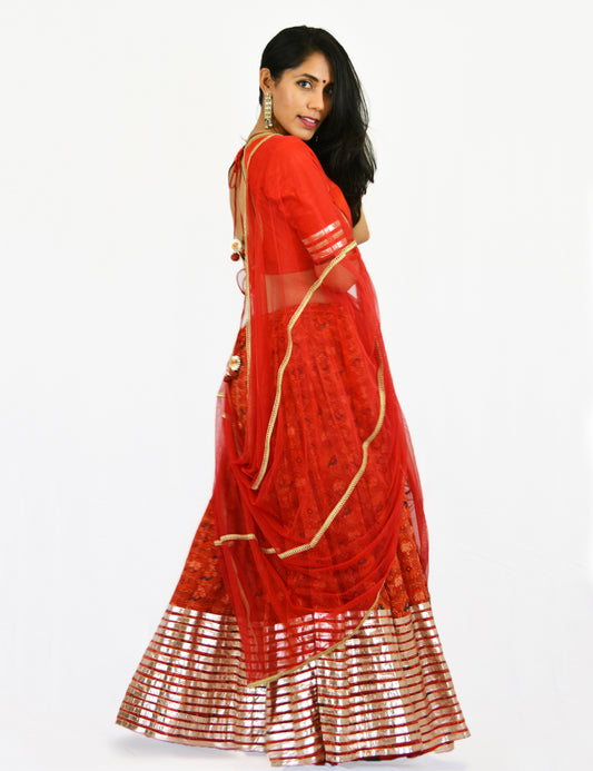 Rent Red Printed Lehenga Skirt with Matching Blouse & Dupatta
