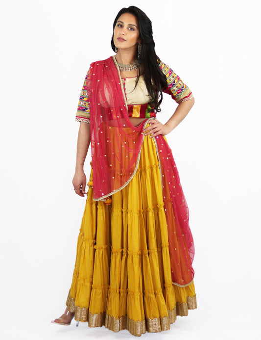 Rent Yellow Tiered Lehenga with Embroidered Blouse & Punch Pink Dupatta