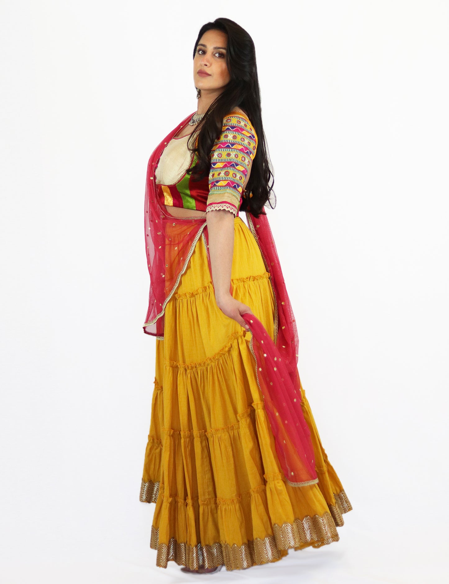 Rent Yellow Tiered Lehenga with Embroidered Blouse & Punch Pink Dupatta