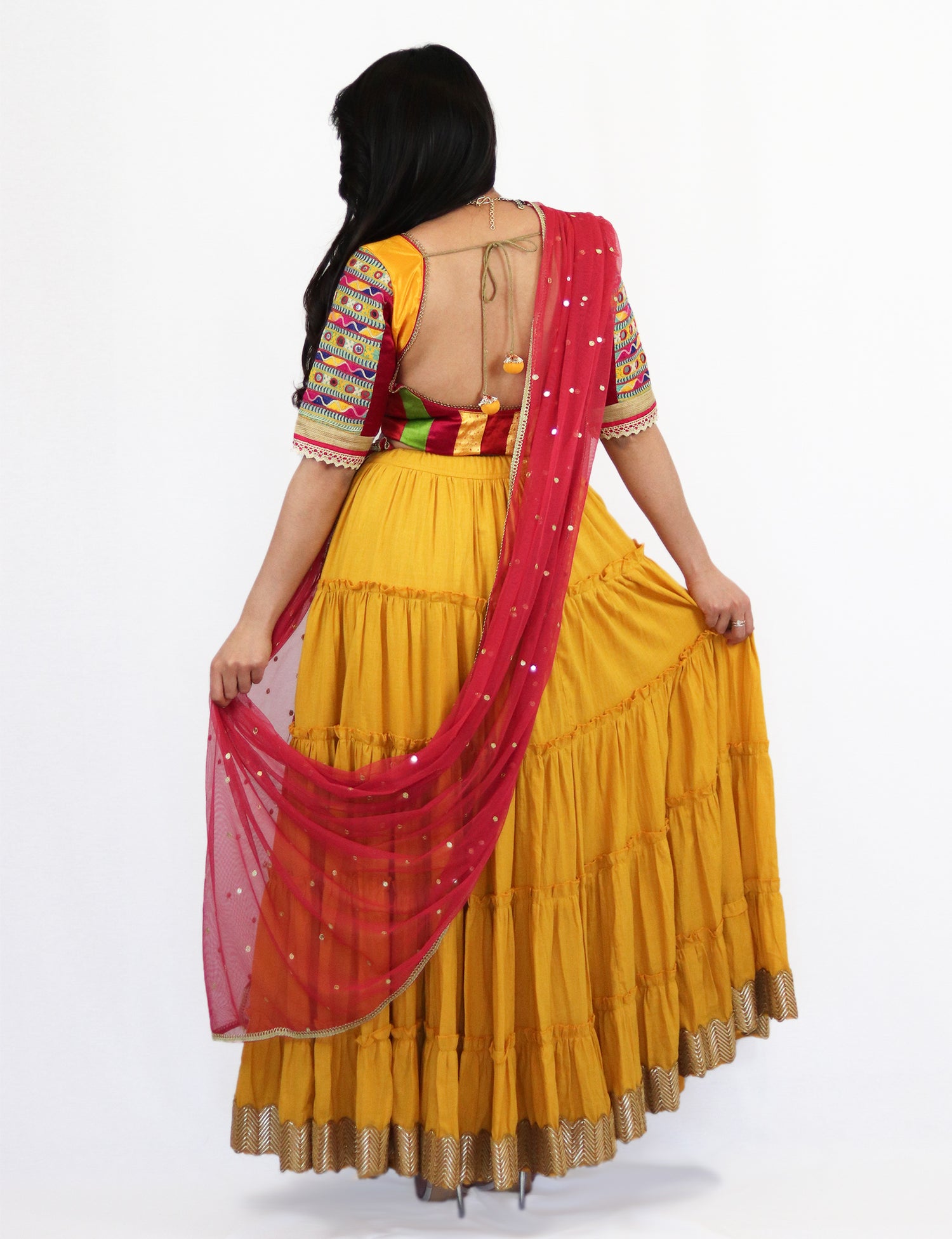Rent Yellow Tiered Lehenga with Embroidered Blouse & Punch Pink Dupatta